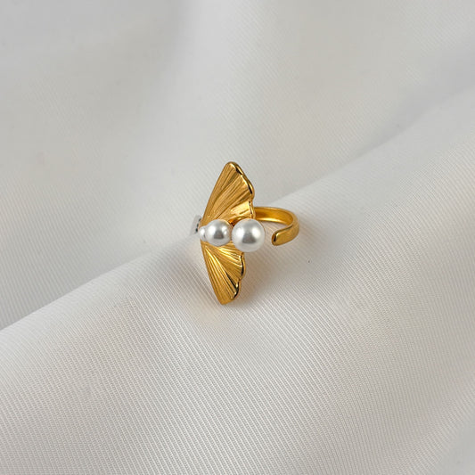 Anillo acero inoxidable con perlas abanico dorado
