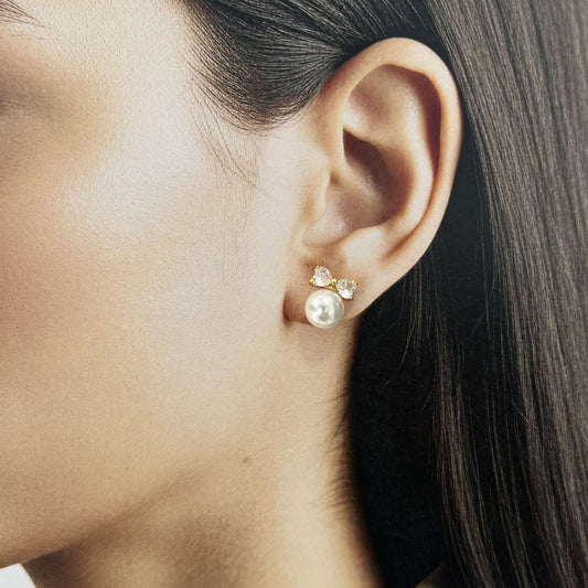 Arete pegado moño zirconia dorado perla sintética grande