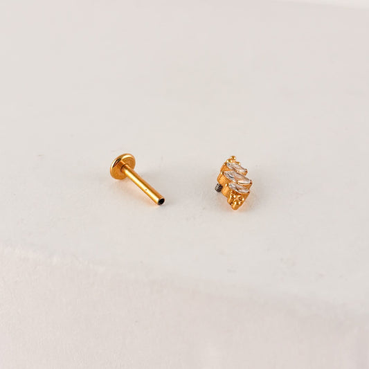 Piercing acero quirúrgico 316L tres zirconias boho dorado