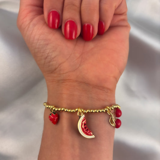 Pulsera bolitas dijes sandía cereza fresa chapa de oro elástico