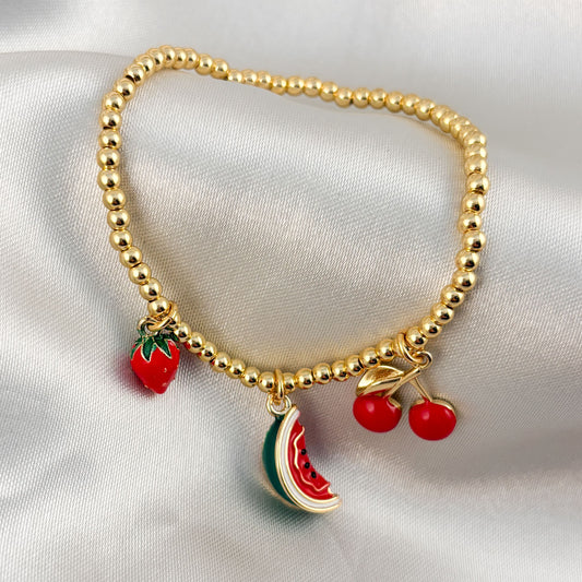 Pulsera bolitas dijes sandía cereza fresa chapa de oro elástico