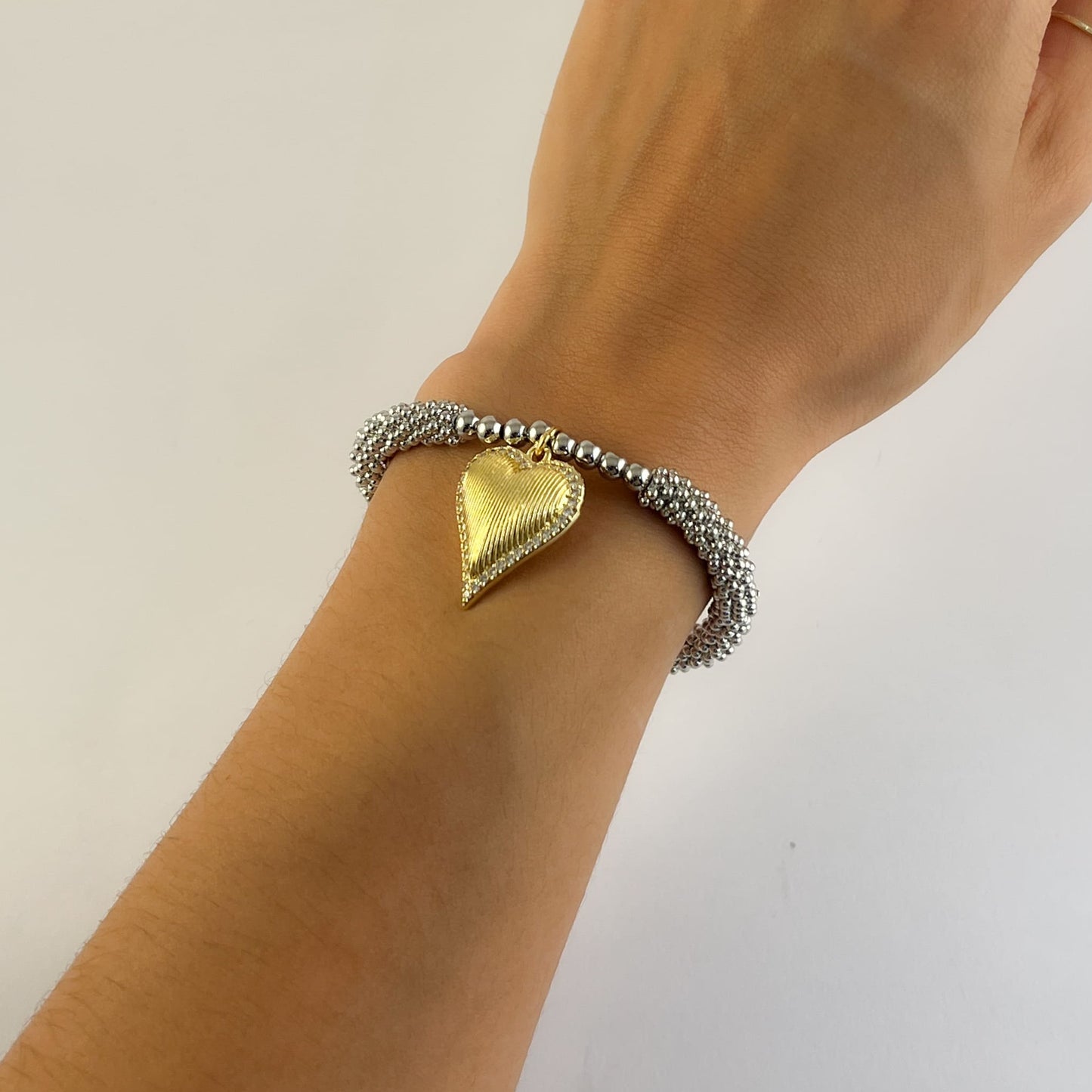 Pulsera mini bolitas bicolor corazon zirconias chapa de oro