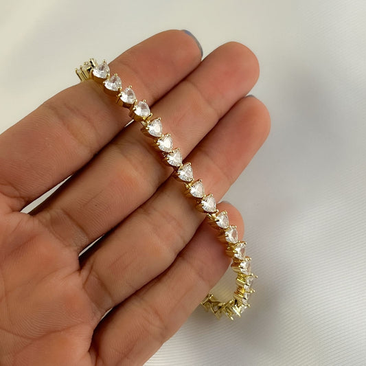 Pulsera tennis corazones zirconias baño de oro 18 cm
