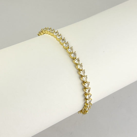 Pulsera tennis corazones zirconias baño de oro 18 cm