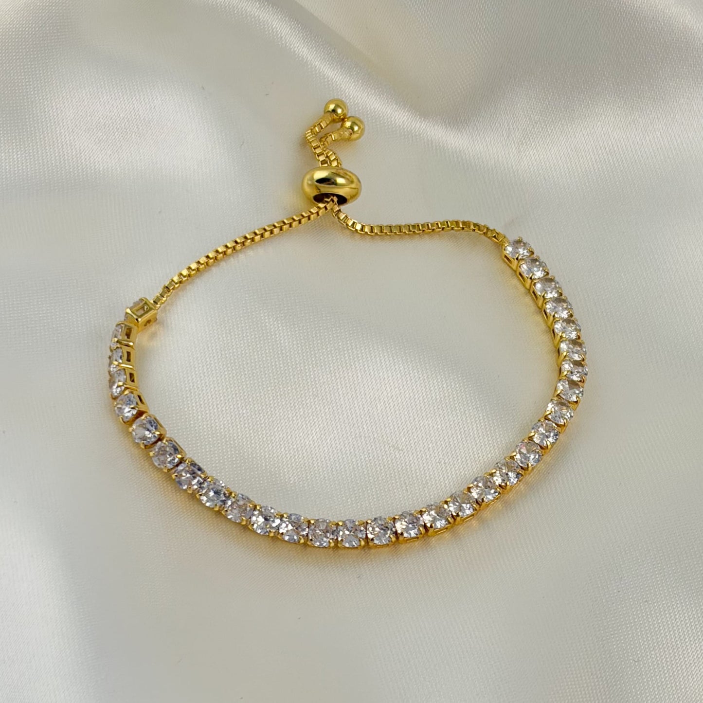 Pulsera baño de oro zirconia redonda ajustable dorada