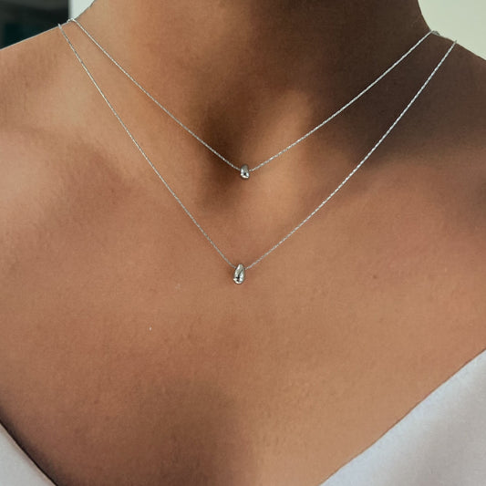 Collar acero doble gota plateada
