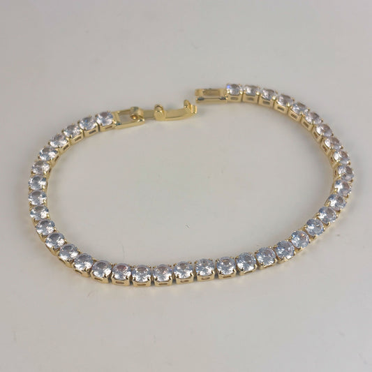 Pulsera zirconias tipo tenis chapa de oro