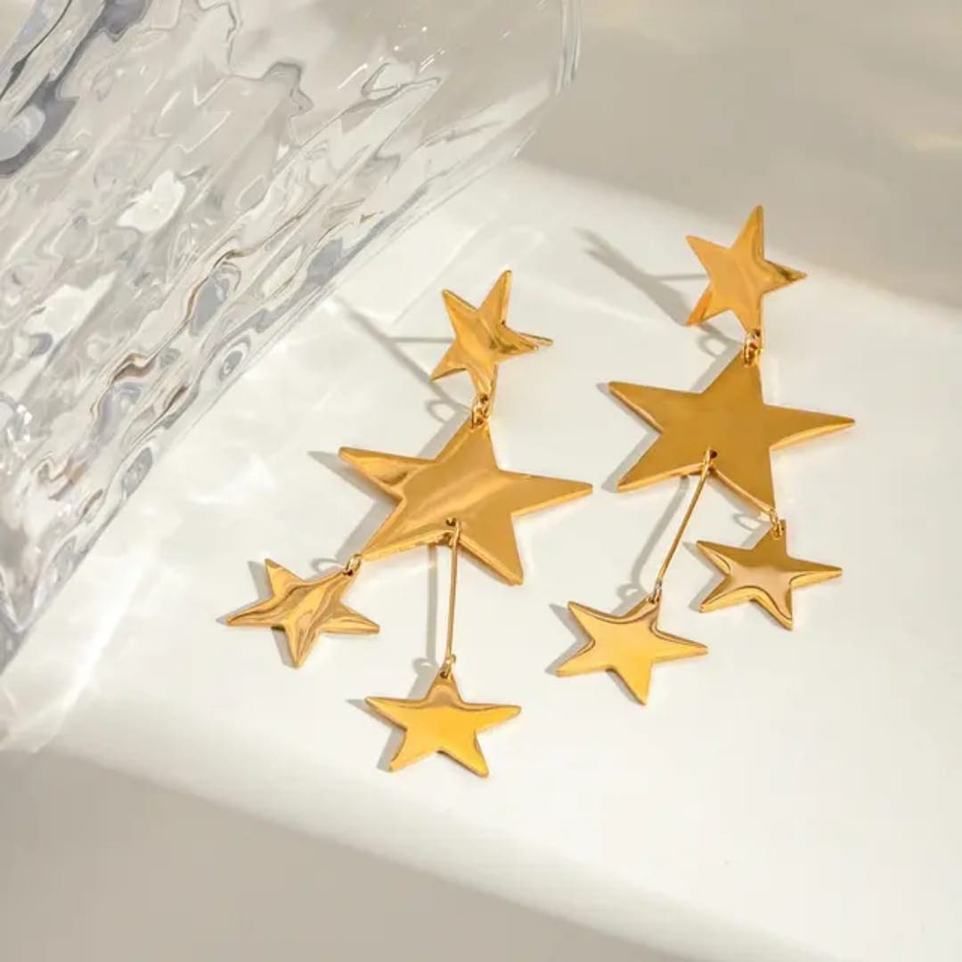 Aretes acero inoxidable premium estrellas dorado