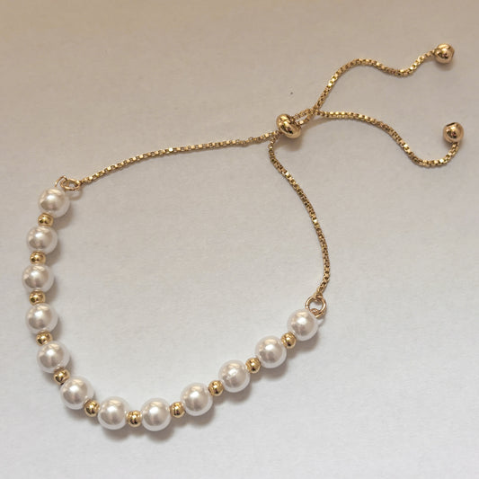 Pulsera perlas bolitas chapa de oro ajustable