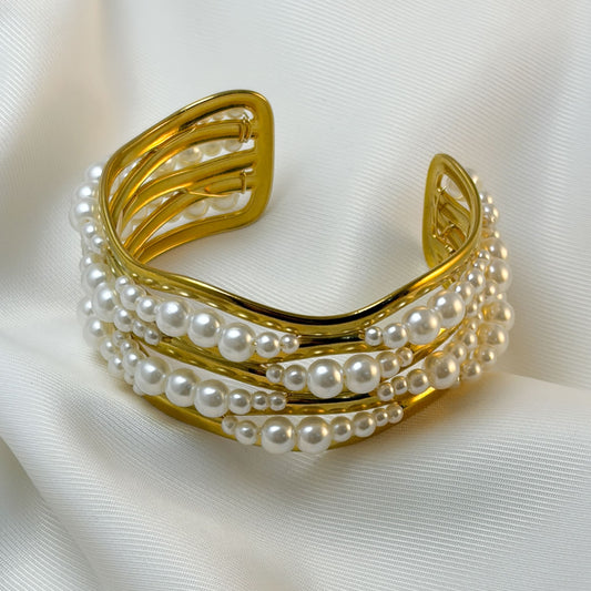 Brazalete grueso ajustable ondas perlitas acero premium dorado