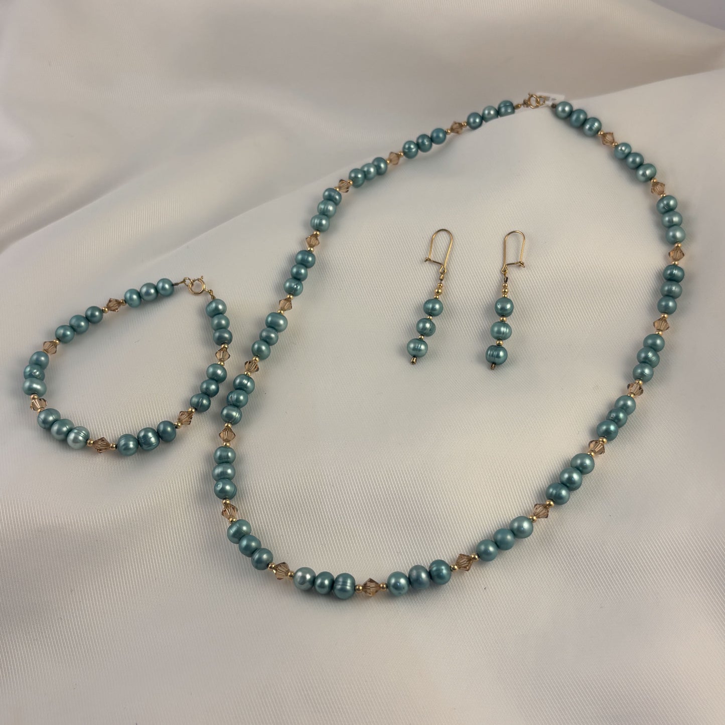 Set collar aretes y pulsera perlas naturalez azules