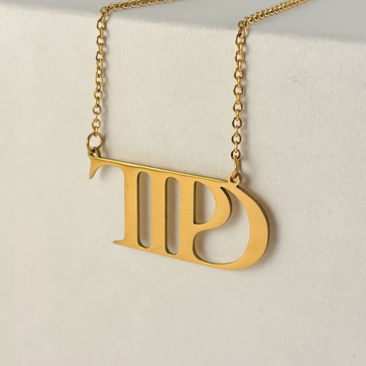 Collar Taylor Swift merch TTPD acero inoxidable