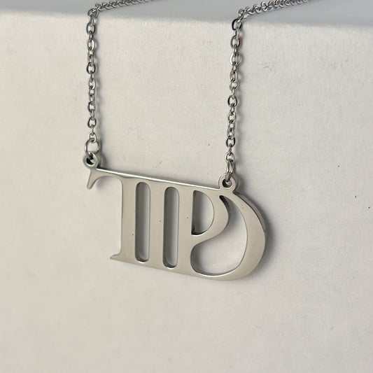 Collar Taylor Swift merch TTPD acero inoxidable