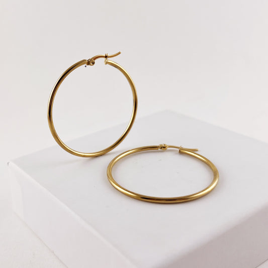 Arracadas acero inoxidable dorado tubular 4 cm