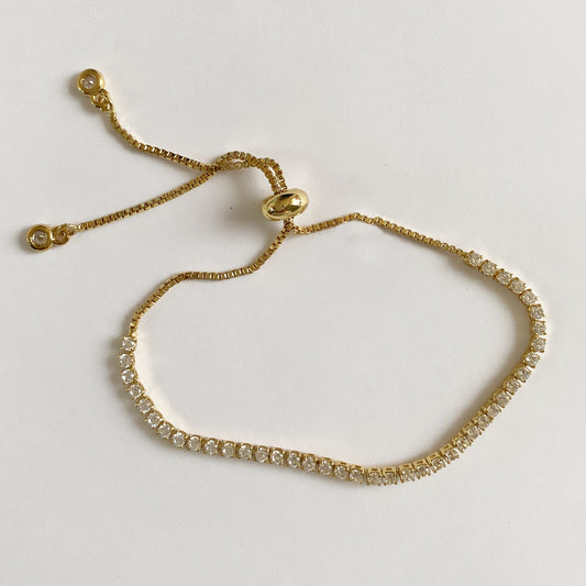 Pulsera ajustable fila cristales chapa de oro