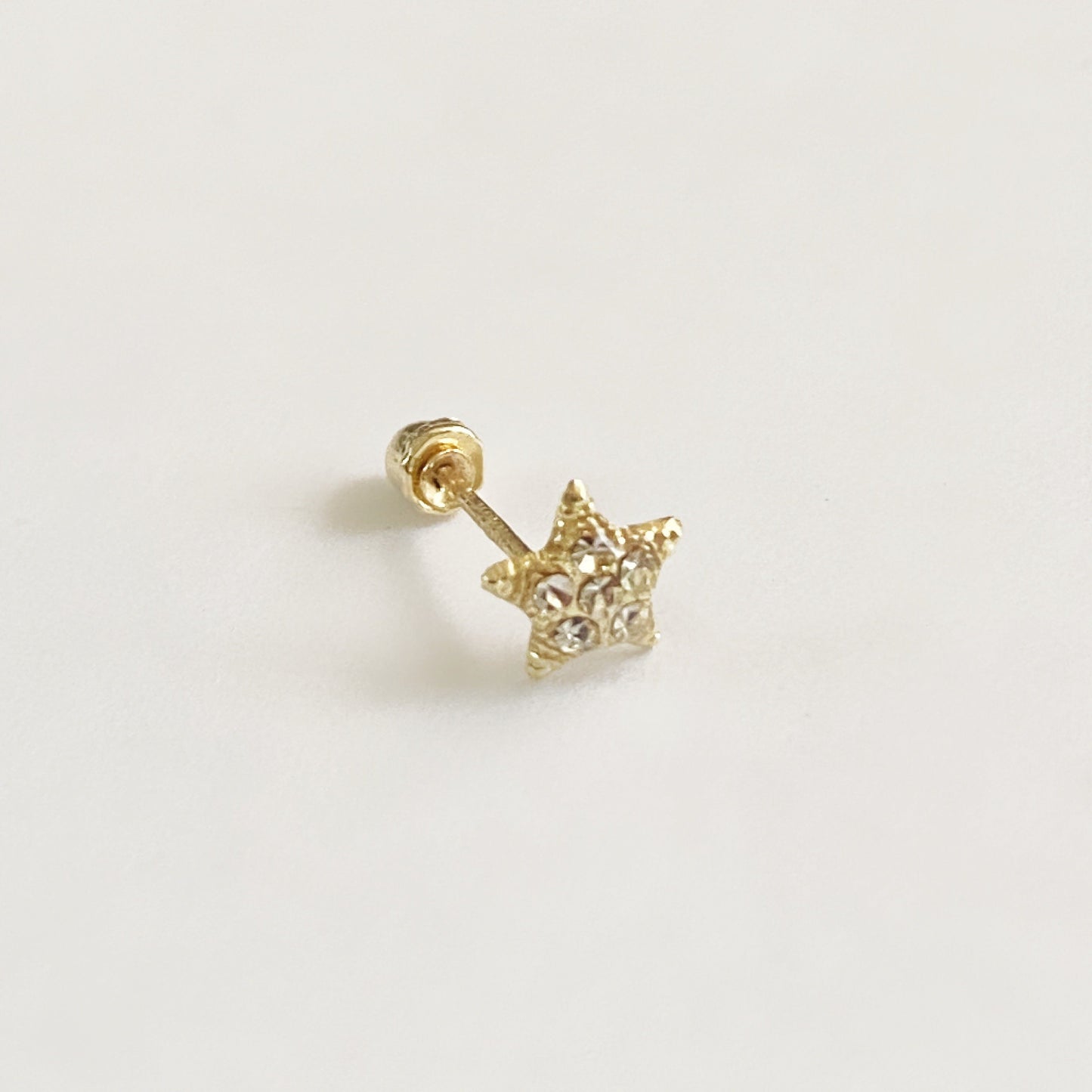 Piercing estrella cristales oro 10k