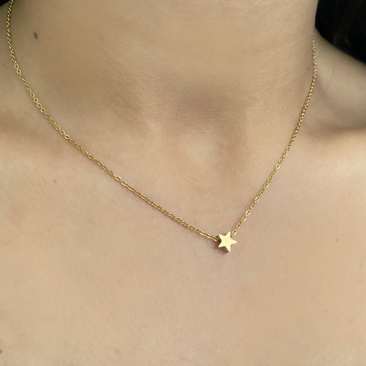 Set collar estrella mini y aretes acero inoxidable dorado